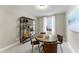 Cozy game room featuring a wood table, four chairs, and a stylish shelving unit at 2019 Kapalua Way # 200, Durham, NC 27703