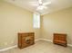 Bedroom featuring tan walls, decorative dresser, neutral carpet, and natural light at 230 Paula Dr, Angier, NC 27501