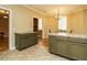 Kitchen area featuring granite countertops and green cabinetry at 230 Paula Dr, Angier, NC 27501