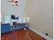 Bright living room with a fireplace, hardwood floors, and windows for plenty of natural light at 230 Paula Dr, Angier, NC 27501