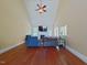 Spacious living room with hardwood floors, vaulted ceiling, and a fireplace at 230 Paula Dr, Angier, NC 27501