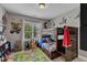This themed bedroom has a twin over full bunk bed, and colorful decorations at 237 Bendemeer Ln, Rolesville, NC 27571