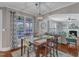 Bright dining area with large windows and modern chandelier at 237 Bendemeer Ln, Rolesville, NC 27571