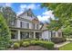 Stylish home with a mix of siding and brick, a welcoming front porch, and manicured landscaping at 237 Bendemeer Ln, Rolesville, NC 27571