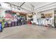 Spacious garage with ample storage, shelving, and a well-organized layout at 237 Bendemeer Ln, Rolesville, NC 27571