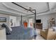 Bright main bedroom features a ceiling fan, plush carpet, and access to a walk-in closet at 237 Bendemeer Ln, Rolesville, NC 27571