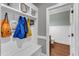 Mud room with convenient storage, built-in bench, and coat hooks for organization at 237 Bendemeer Ln, Rolesville, NC 27571