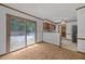 Bright dining area with sliding glass door and easy access to the kitchen at 2382 Council Rd, Graham, NC 27253