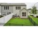 Backyard with privacy fence, small patio, and green space, ideal for relaxing and entertaining at 241 White Oak Ridge Dr, Garner, NC 27529