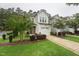 Charming two-story home with a one car garage, landscaped front yard, and inviting curb appeal at 241 White Oak Ridge Dr, Garner, NC 27529