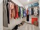 Large walk-in closet featuring metal shelving, hanging racks and rod for clothing, and shoe racks at 241 White Oak Ridge Dr, Garner, NC 27529