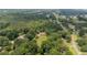 Stunning property featuring a private home nestled among lush, mature trees and landscaped grounds at 2523 Lovette Ln, Graham, NC 27253