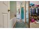 Hallway view of a bath featuring tile floors, bath tub, walk-in shower, and walk-in closet at 3013 Brassfield Dr, Rocky Mount, NC 27803