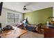 This bedroom has a window view and is furnished with a bed and desk at 3013 Brassfield Dr, Rocky Mount, NC 27803