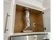 Exposed ductwork is visible inside a white kitchen cabinet at 3103 White Blossom Ct, Raleigh, NC 27610