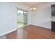 Bright dining area with wood floors and sliding door provides easy access to the outdoors at 321 Westgrove Ct, Durham, NC 27703