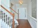 Bright foyer features hardwood floors, white trim, and a staircase at 321 Westgrove Ct, Durham, NC 27703