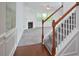 Open-concept living space includes a fireplace, neutral carpet, and natural light at 321 Westgrove Ct, Durham, NC 27703