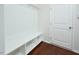 Functional mudroom with built-in bench and storage provides an organized transition from the outdoors at 321 Westgrove Ct, Durham, NC 27703