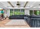 Finished basement with a sectional couch and open floor plan that offers a inviting living space at 322 Scheer Ave, Durham, NC 27703