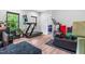 Bright gym space with large windows, exercise equipment, and room for a healthy lifestyle at 322 Scheer Ave, Durham, NC 27703