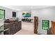 Comfortable living room with large television and couch, perfect for entertainment and relaxation at 322 Scheer Ave, Durham, NC 27703