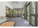 Enjoy outdoor living on this screened porch featuring two egg chairs with cushions at 322 Scheer Ave, Durham, NC 27703