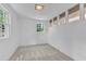 Bright basement area with neutral carpet and window provides great natural light at 3221 Ward Rd, Raleigh, NC 27604