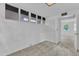Bright bedroom features natural light and neutral carpet, plus closet space and easy access to additional rooms at 3221 Ward Rd, Raleigh, NC 27604