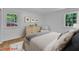 This bedroom has two windows providing lots of natural light at 3221 Ward Rd, Raleigh, NC 27604