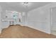 Bright and open kitchen with stainless steel appliances and hardwood floors, offering modern convenience at 3221 Ward Rd, Raleigh, NC 27604