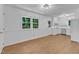 Spacious kitchen and living area with hardwood floors and natural light, great for entertaining at 3221 Ward Rd, Raleigh, NC 27604