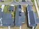 Overhead shot of homes with solar panels and neat landscaping, highlighting energy efficiency and design at 34 Millennium Dr, Pittsboro, NC 27312