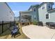 Spacious backyard featuring a patio, seating, and well-maintained lawn at 34 Millennium Dr, Pittsboro, NC 27312