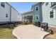 Backyard with a cozy outdoor patio, complete with seating and grills at 34 Millennium Dr, Pittsboro, NC 27312