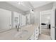 Bathroom with double vanity and a large mirror at 34 Millennium Dr, Pittsboro, NC 27312