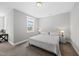 Inviting bedroom featuring a king bed and a view to an office at 34 Millennium Dr, Pittsboro, NC 27312