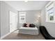 Bedroom with daybed and chair at 34 Millennium Dr, Pittsboro, NC 27312