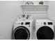 Convenient laundry room features modern appliances and ample storage space at 34 Millennium Dr, Pittsboro, NC 27312