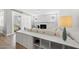 Bright living room with fireplace, open to outdoor patio via sliding glass doors at 34 Millennium Dr, Pittsboro, NC 27312