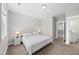 Serene main bedroom boasts a king bed and an open en-suite at 34 Millennium Dr, Pittsboro, NC 27312