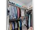 Spacious walk-in closet with organized storage for clothes and accessories at 34 Millennium Dr, Pittsboro, NC 27312