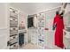 Organized walk-in closet with shelving, hanging rods, and storage baskets for maximum space and efficiency at 3540 Rugby Rd, Durham, NC 27707