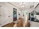 Charming foyer with hardwood floors, decorative lighting, and elegant decor at 3540 Rugby Rd, Durham, NC 27707