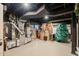 Unfinished basement area containing the furnace, water filtration system and various stored items at 3540 Rugby Rd, Durham, NC 27707