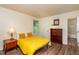 Comfortable bedroom features hardwood floors, and access to a private bathroom at 3616 Culater Ct, Raleigh, NC 27616