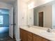The bathroom has a double sink vanity at 381 Gray Ghost Ln, Benson, NC 27504