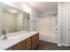 The bathroom features a double sink vanity at 381 Gray Ghost Ln, Benson, NC 27504