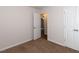 This bedroom has neutral carpet, a closet and is freshly painted at 381 Gray Ghost Ln, Benson, NC 27504