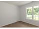 Minimalist bedroom with natural light offering a serene and bright atmosphere at 381 Gray Ghost Ln, Benson, NC 27504